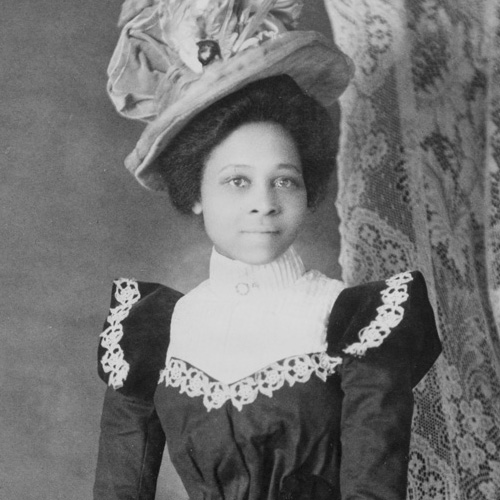Young African American woman, three-quarter length portrait