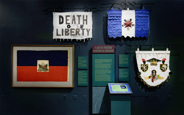 Museum display of various Black historical flags