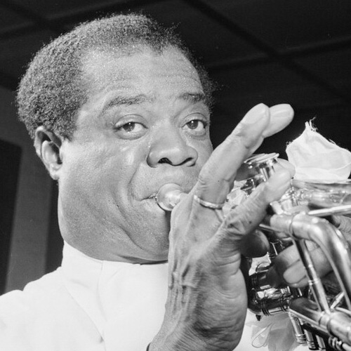 Louis Armstrong playing trumpet at Carnegie Hall 1947