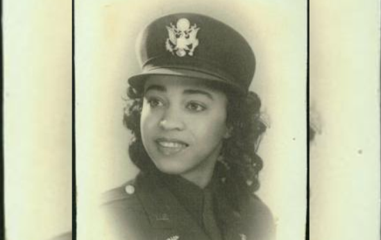 Black and white photograph of Dorothy M. Jenkins in her U.S. Army dress uniform with Army Medical Corps pins on her lapels. October 1944